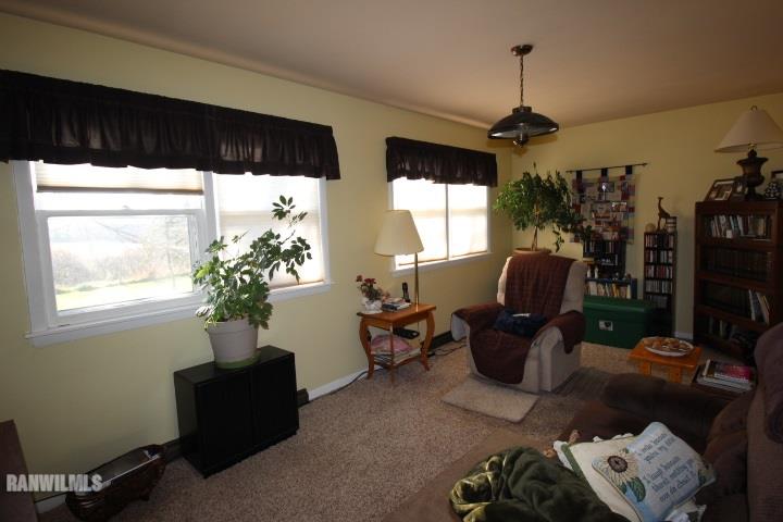 7559 West Dublin Road Freeport, IL 61032 - Photo 17 of 22 a living room with furniture and a large window