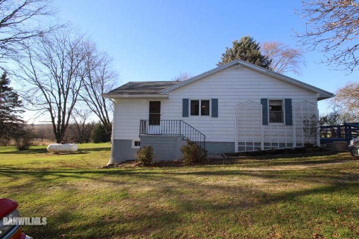 7559 West Dublin Road Freeport, IL 61032 - Photo 3 of 22 a view of a house with a yard