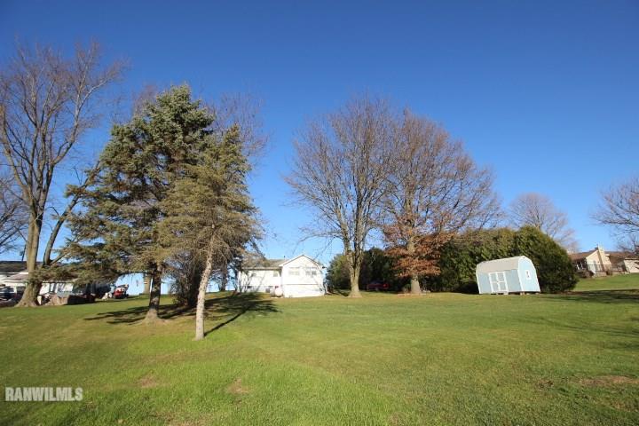 7559 West Dublin Road Freeport, IL 61032 - Photo 4 of 22 a view of a field with a tree