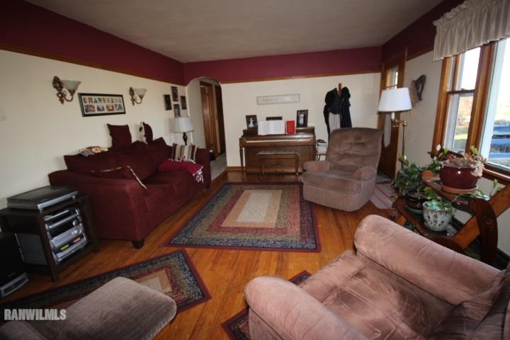 7559 West Dublin Road Freeport, IL 61032 - Photo 6 of 22 a living room with furniture and wooden floor