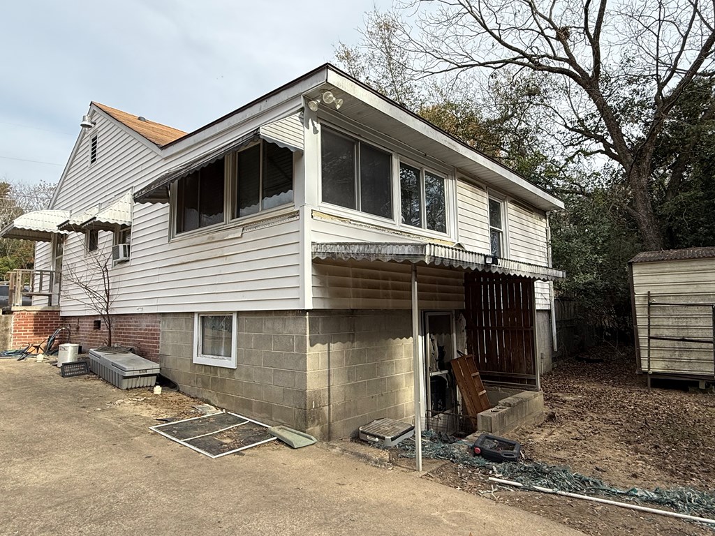 3938 Linden Circle Columbus, GA 31907 - Photo 7 of 8 a front view of a house with a yard