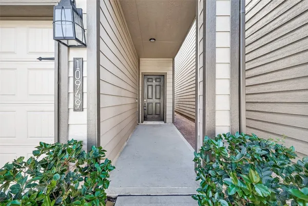 a view of a pathway besides a building
