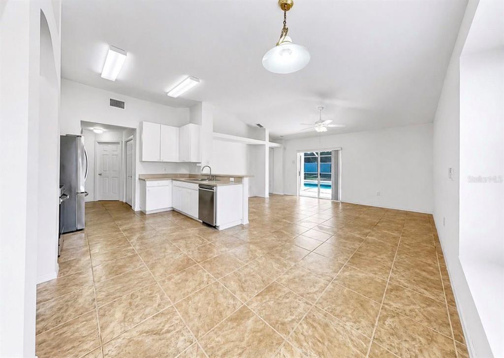 10725 Deepbrook Drive Riverview, FL 33569 - Photo 24 of 67 a view of empty room with wooden floor