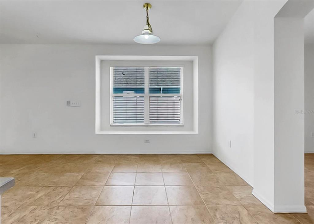 10725 Deepbrook Drive Riverview, FL 33569 - Photo 25 of 67 a view of an empty room with a window