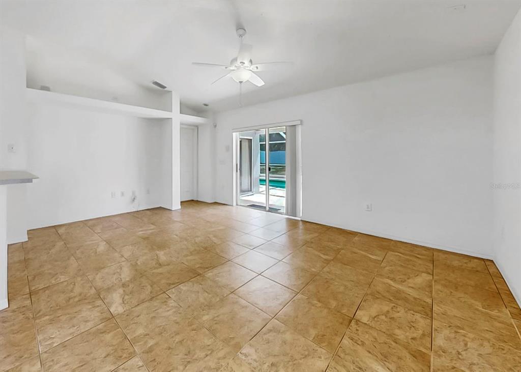 10725 Deepbrook Drive Riverview, FL 33569 - Photo 29 of 67 a view of an empty room with glass door