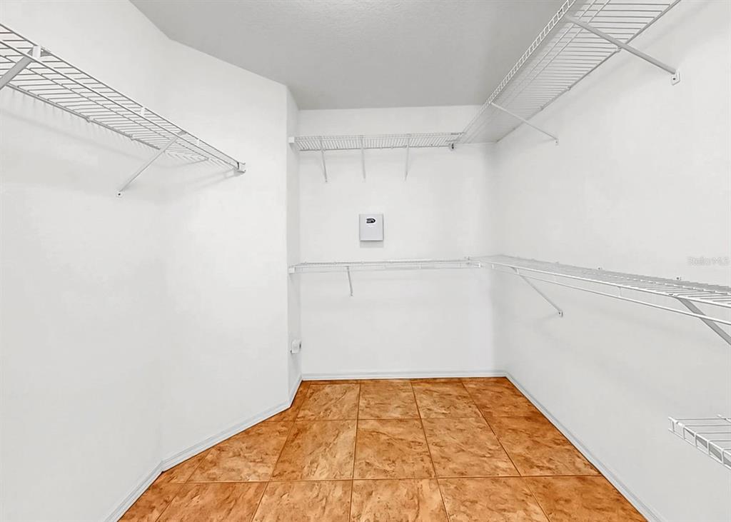 10725 Deepbrook Drive Riverview, FL 33569 - Photo 36 of 67 a view of a room with racks on the wall