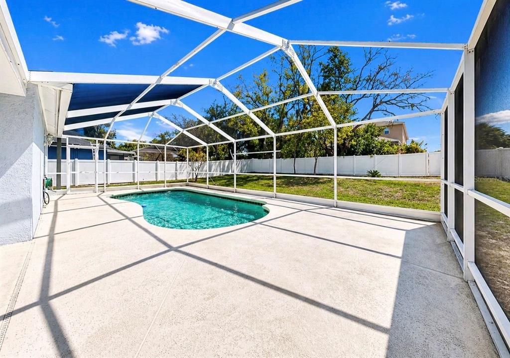 10725 Deepbrook Drive Riverview, FL 33569 - Photo 43 of 67 a view of a swimming pool with a porch