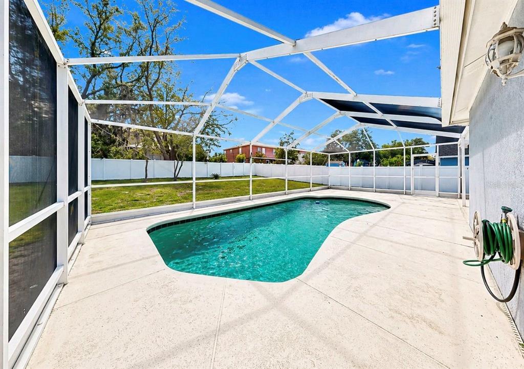 10725 Deepbrook Drive Riverview, FL 33569 - Photo 44 of 67 a view of a swimming pool with a patio