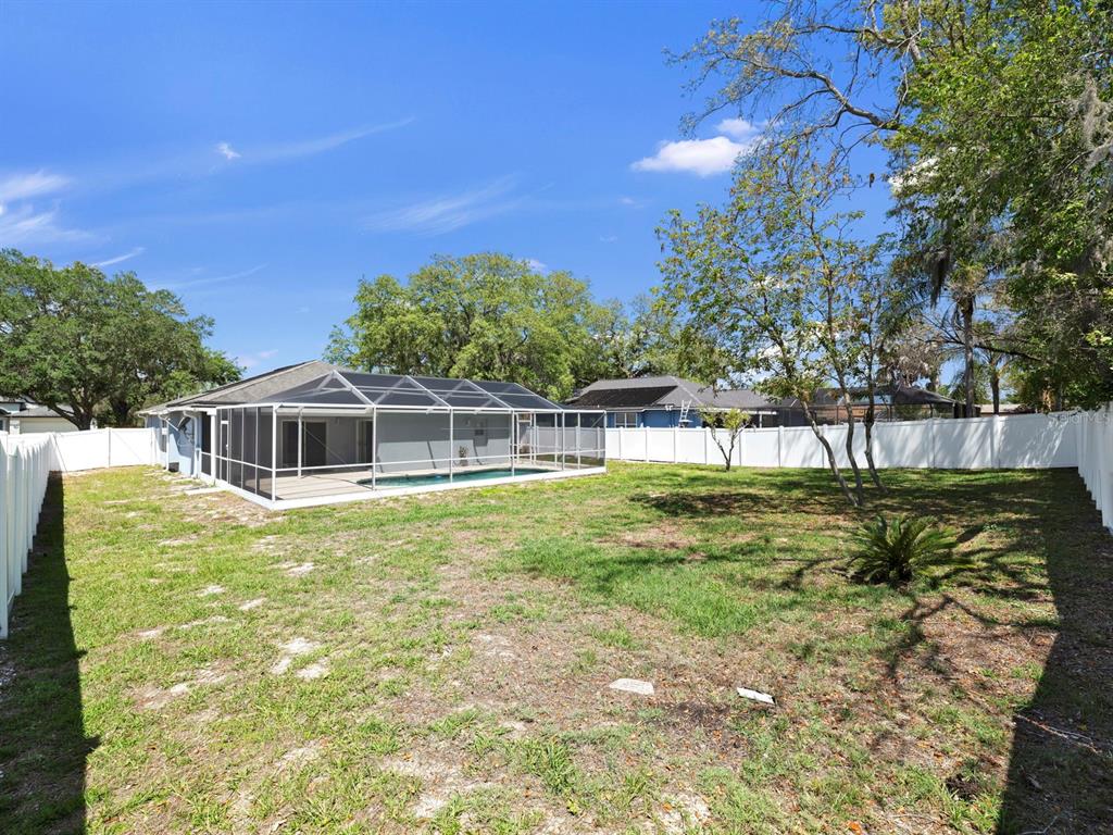 10725 Deepbrook Drive Riverview, FL 33569 - Photo 49 of 67 a view of a house with a yard