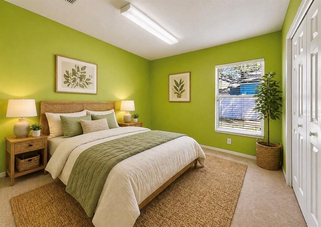 10725 Deepbrook Drive Riverview, FL 33569 - Photo 56 of 67 a bedroom with a bed and a painting on the wall