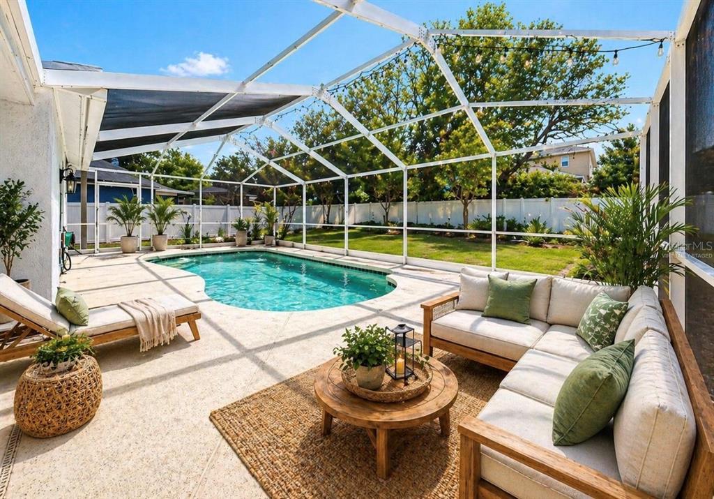 10725 Deepbrook Drive Riverview, FL 33569 - Photo 58 of 67 a view of a backyard with swimming pool and furniture