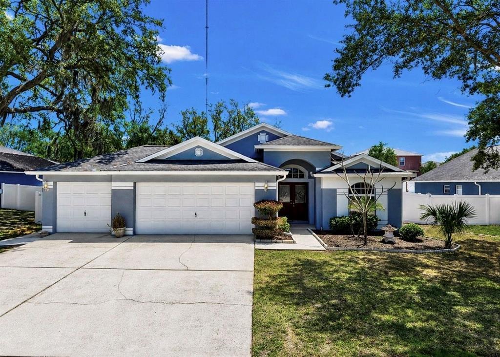 10725 Deepbrook Drive Riverview, FL 33569 - Photo 6 of 67 a front view of a house with a yard