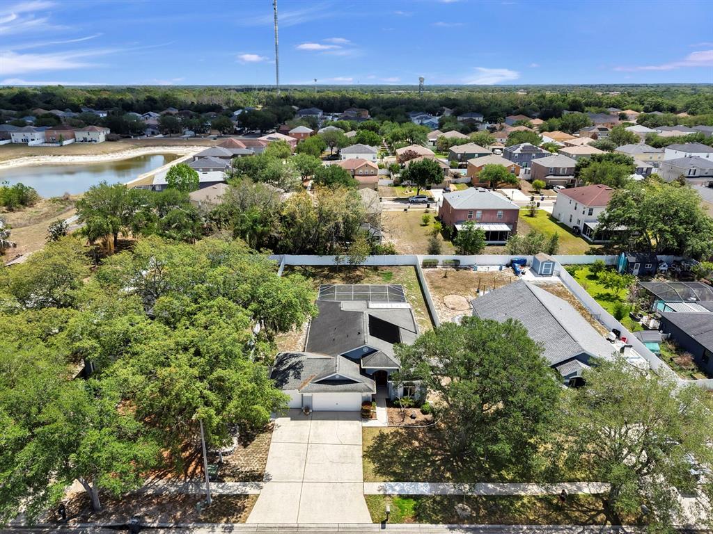 10725 Deepbrook Drive Riverview, FL 33569 - Photo 65 of 67 an aerial view of residential houses with outdoor space and trees