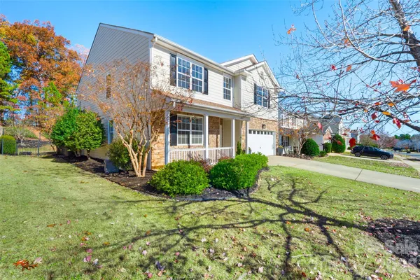 a bed room with a bed and a lamp