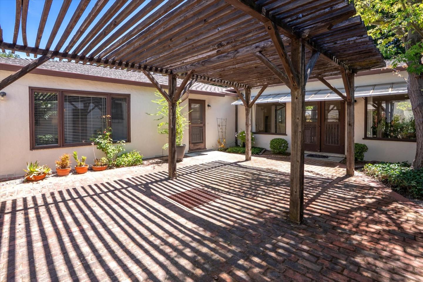 16899 Kennedy Road Los Gatos, CA 95032 - Photo 37 of 61 a view of a porch with wooden floor