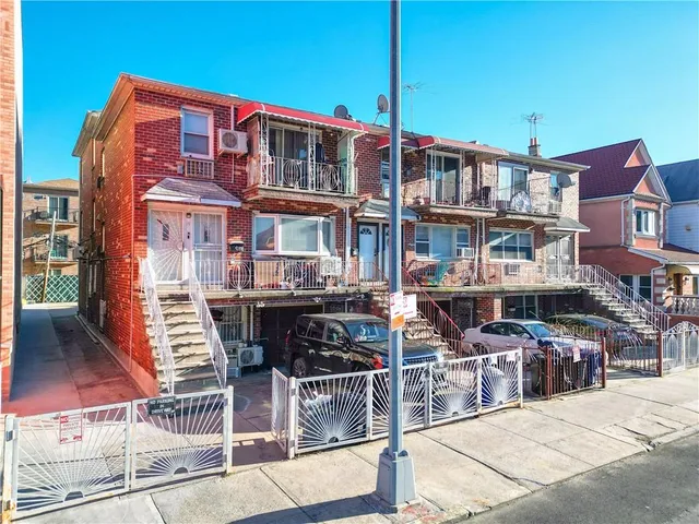 a front view of a building with street