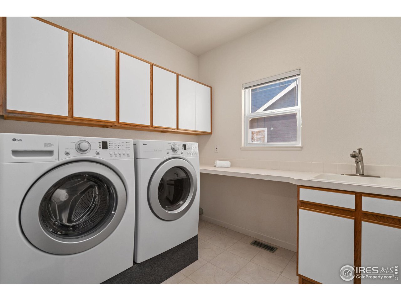 2444 Eagleview Circle Longmont, CO 80504 - Photo 26 of 37 Main Level Laundry Room