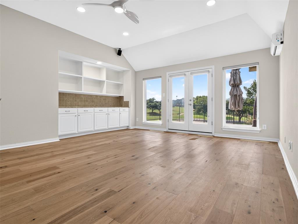 6809 Cedar Ridge Court Plano, TX 75093 - Photo 25 of 38 Vaulted ceiling featuring recessed lighting and a ceiling fan