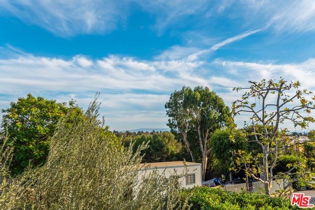 a view of a balcony with an outdoor space
