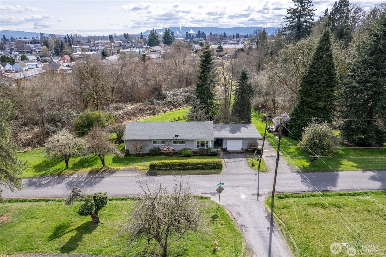 a aerial view of a house with garden