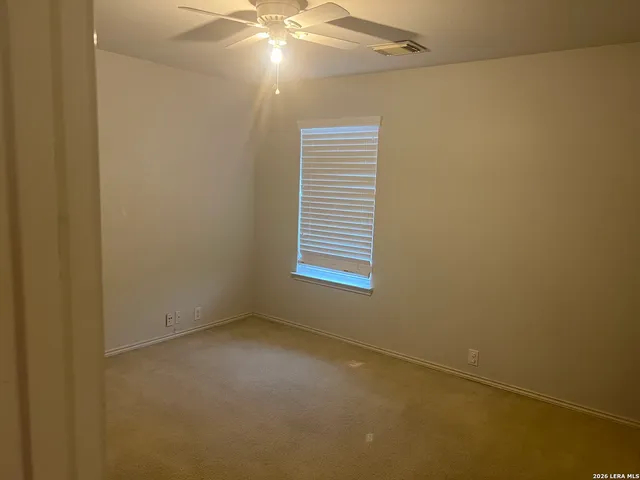 a bathroom with a sink double vanity and a mirror