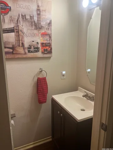 a view of a house with backyard and porch