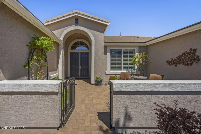 a view of building with a potted plant