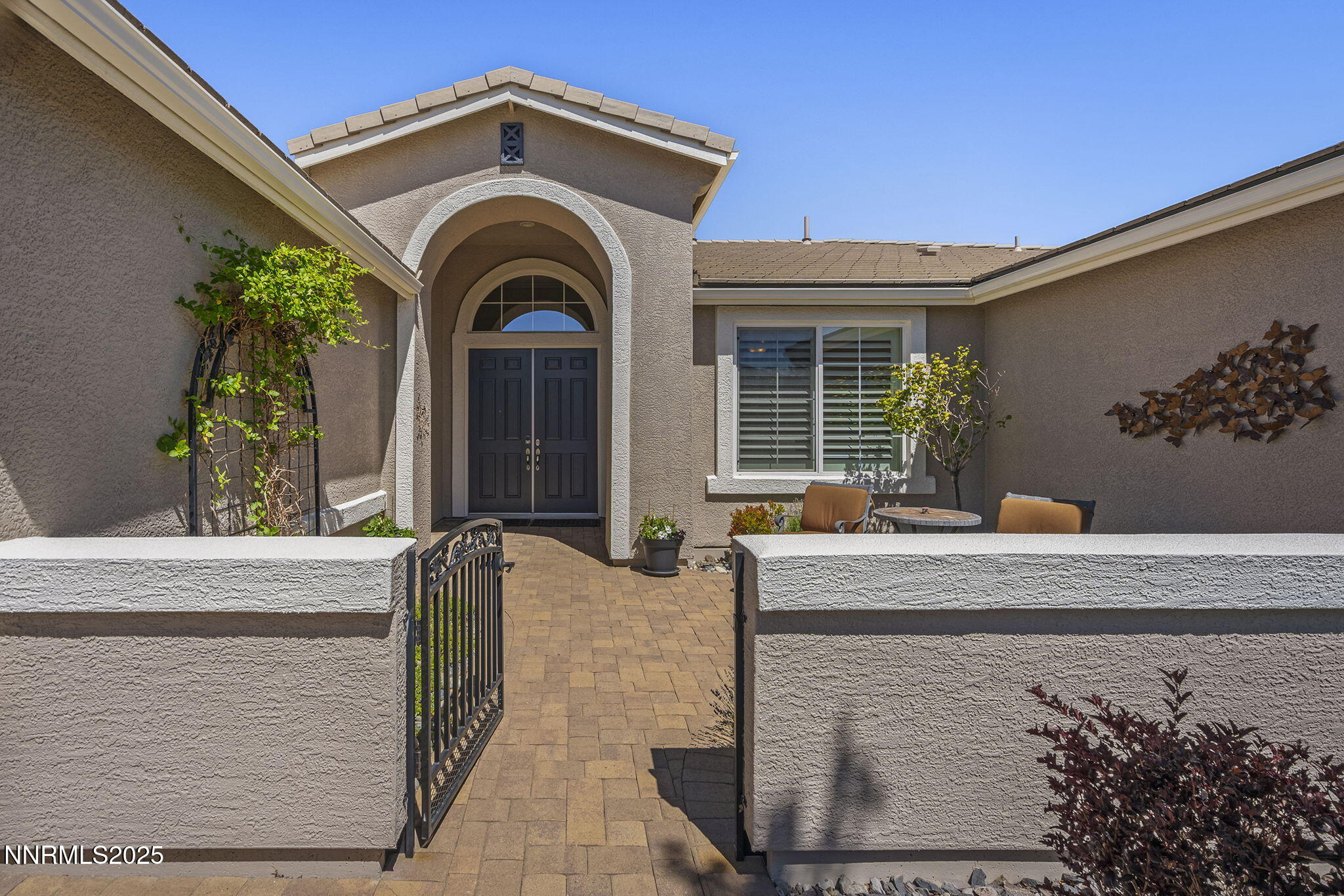 a view of building with a potted plant