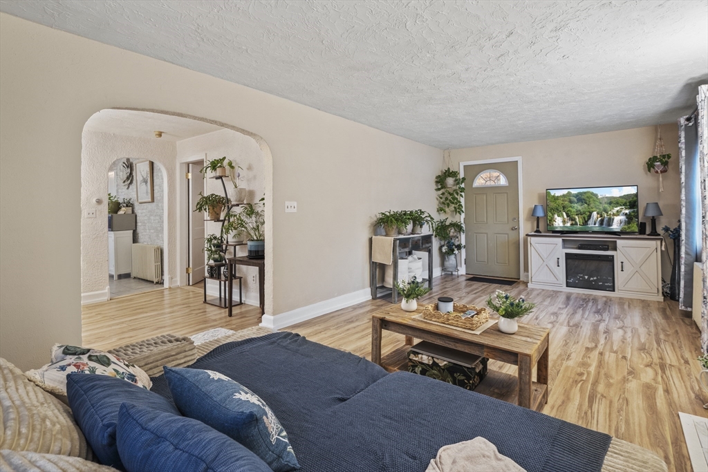 170 Stafford Street Worcester, MA 01603 - Photo 12 of 29 a living room with furniture and wooden floor