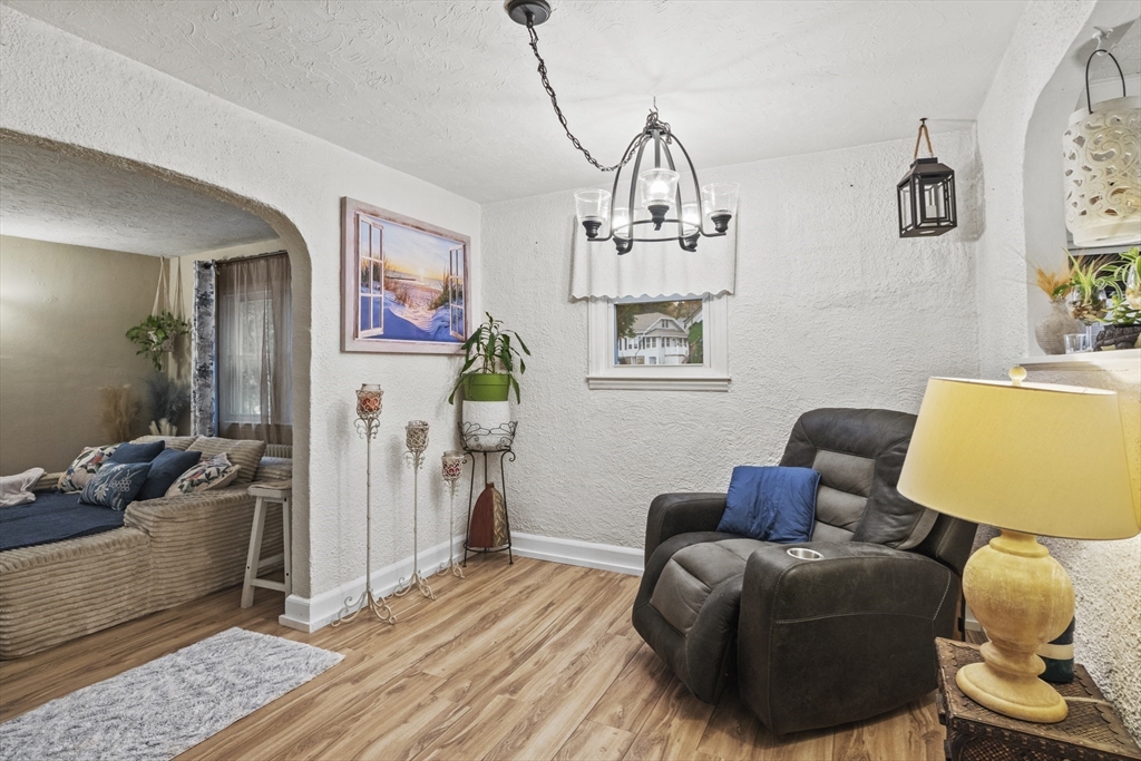 170 Stafford Street Worcester, MA 01603 - Photo 13 of 29 a living room with furniture and wooden floor