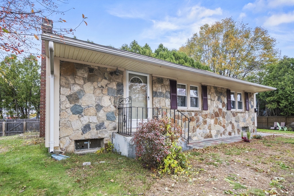 170 Stafford Street Worcester, MA 01603 - Photo 2 of 29 front view of a house with a yard