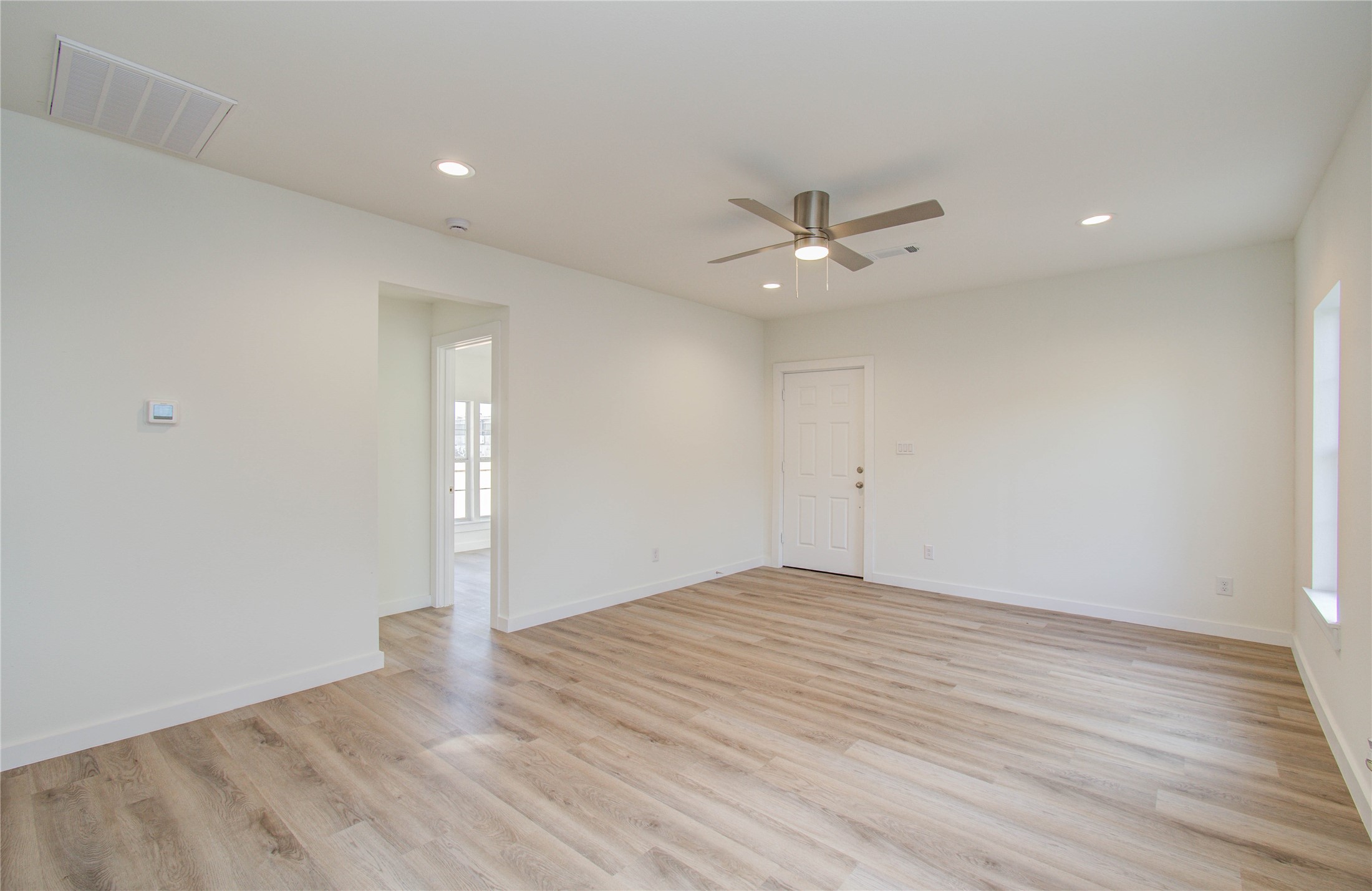 1301 Southgate Drive Rosenberg, TX 77471 - Photo 21 of 49 an empty room with fan and a ceiling fan