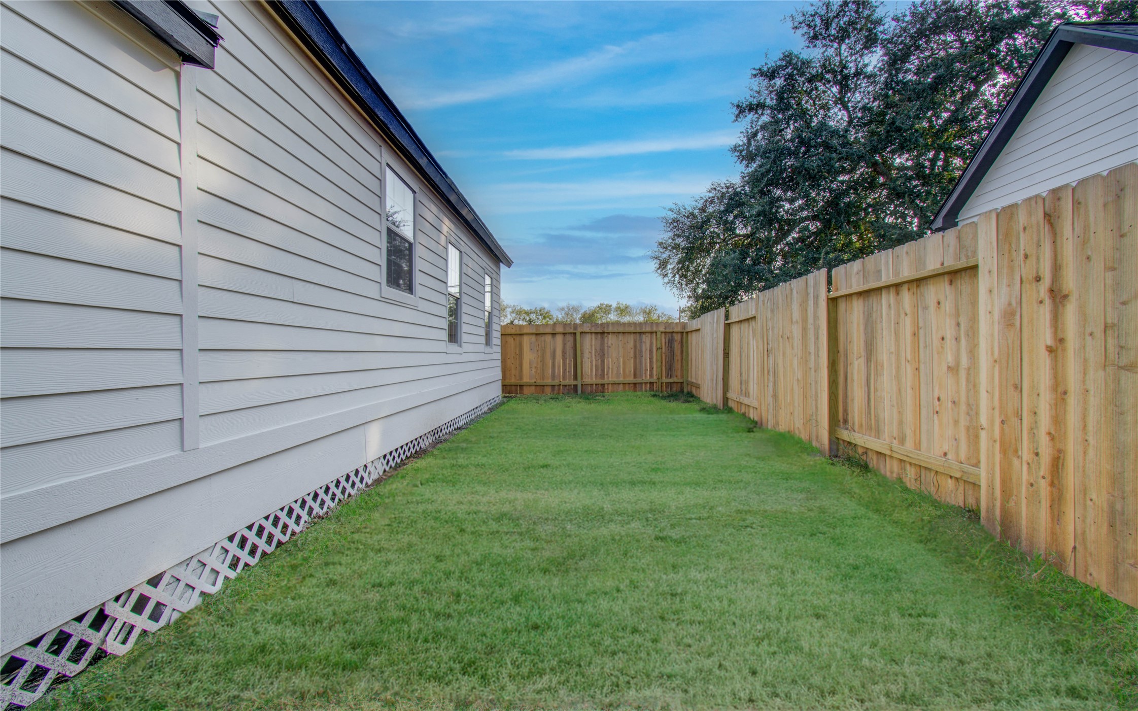 1301 Southgate Drive Rosenberg, TX 77471 - Photo 26 of 49 a view of backyard with garden