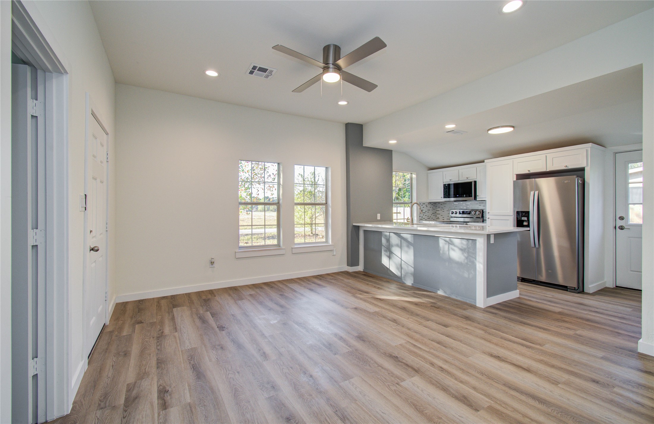 1301 Southgate Drive Rosenberg, TX 77471 - Photo 31 of 49 a view of kitchen with cabinets and wooden floor