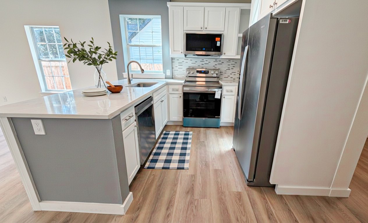 1301 Southgate Drive Rosenberg, TX 77471 - Photo 38 of 49 a kitchen with a sink appliances and wooden floor