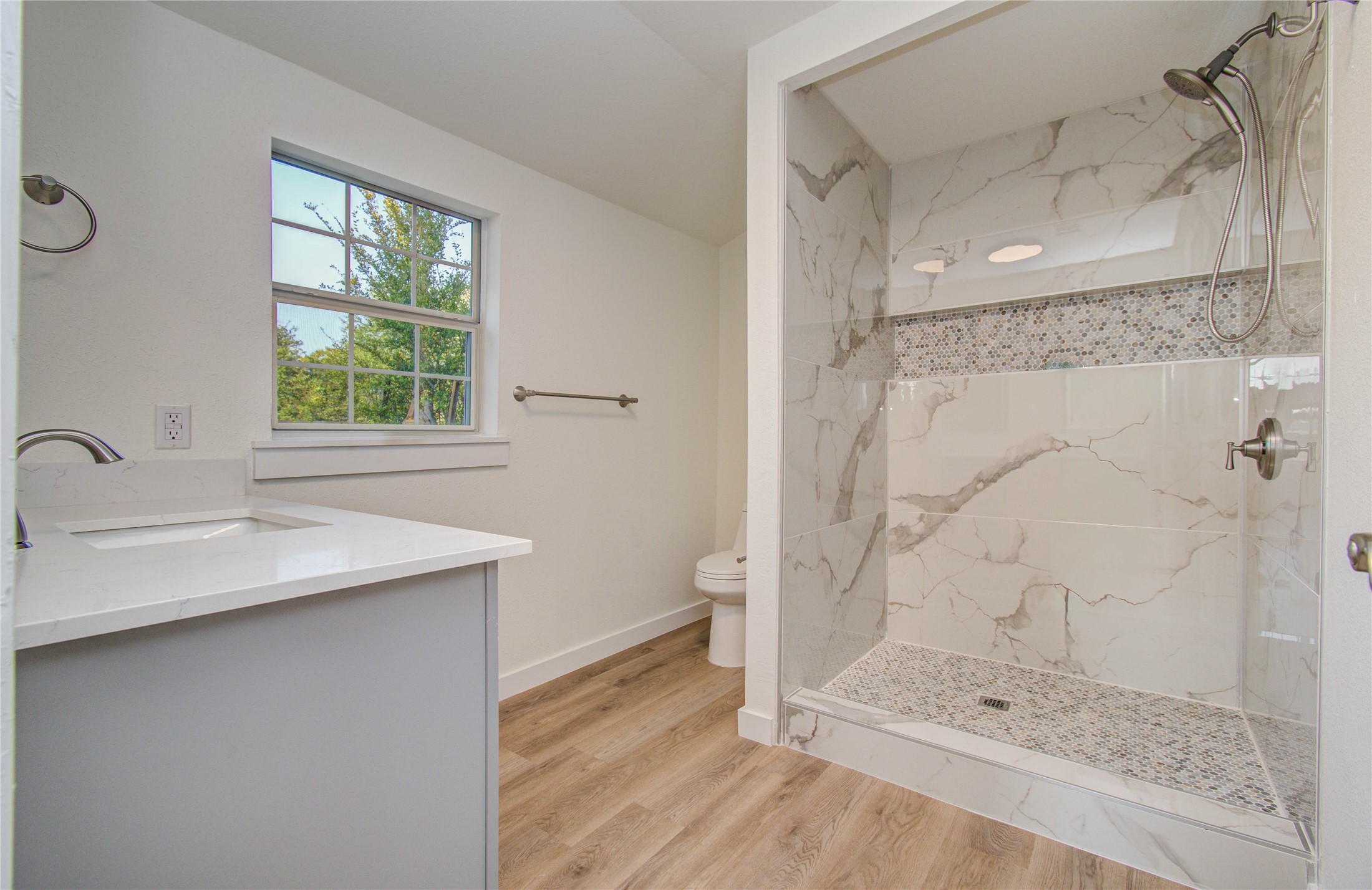 1301 Southgate Drive Rosenberg, TX 77471 - Photo 40 of 49 a bathroom with a granite countertop sink a toilet and shower