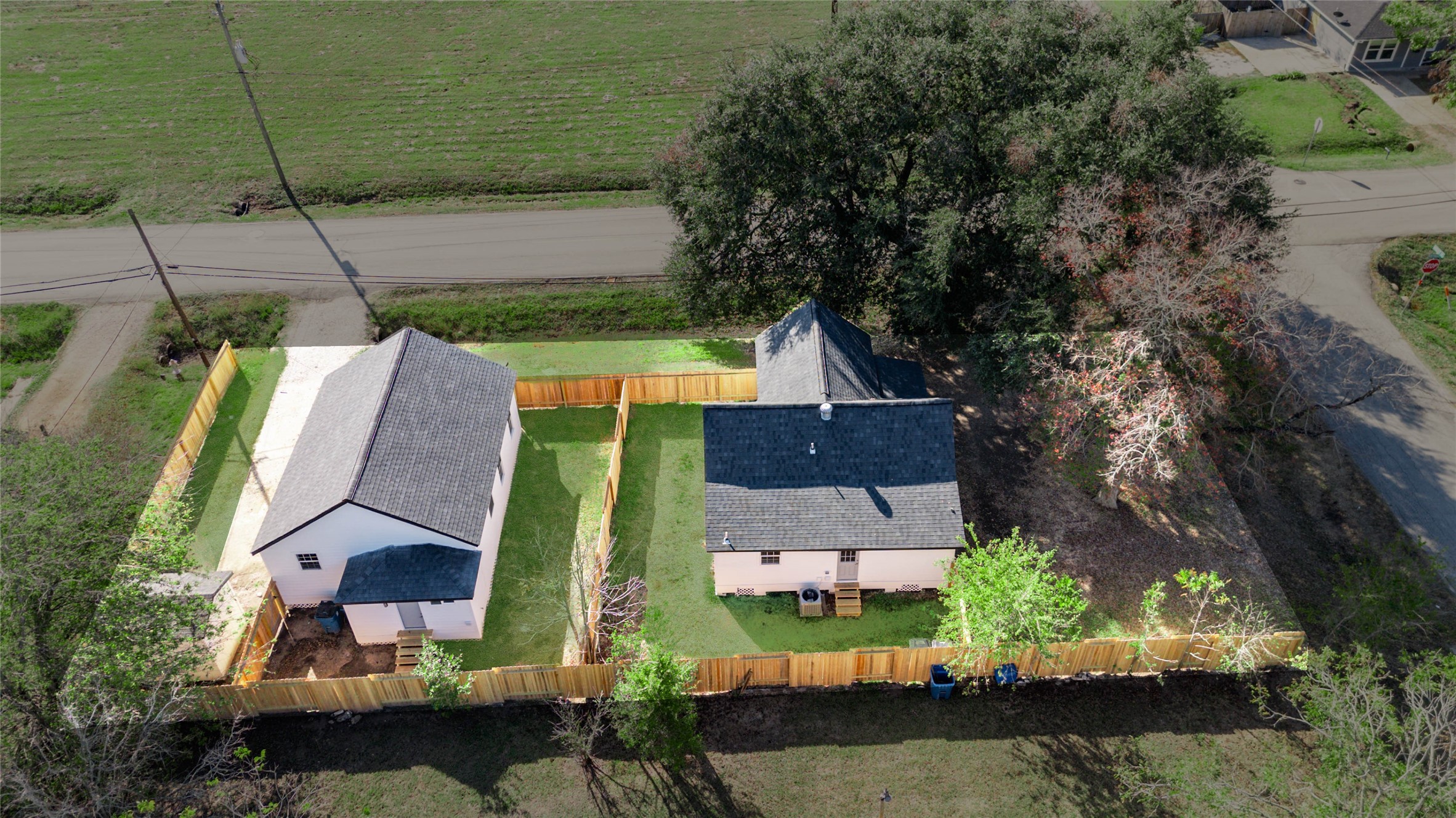 1301 Southgate Drive Rosenberg, TX 77471 - Photo 5 of 49 an aerial view of a house with a garden and lake view
