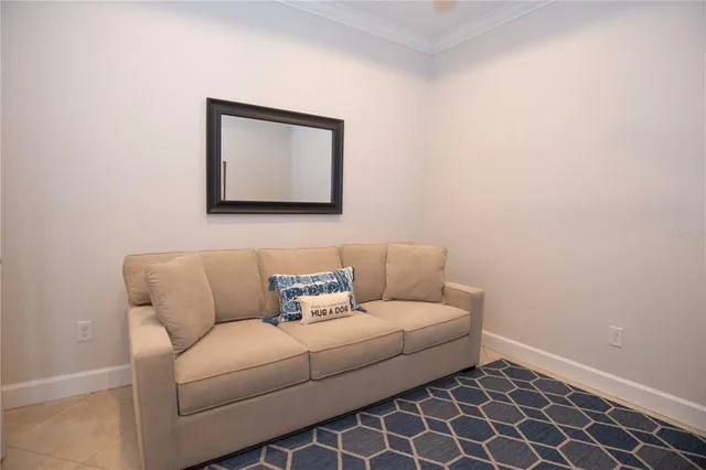 a view of a room with gym equipment and air hockey table