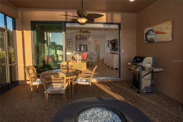 a view of a swimming pool with wooden fence