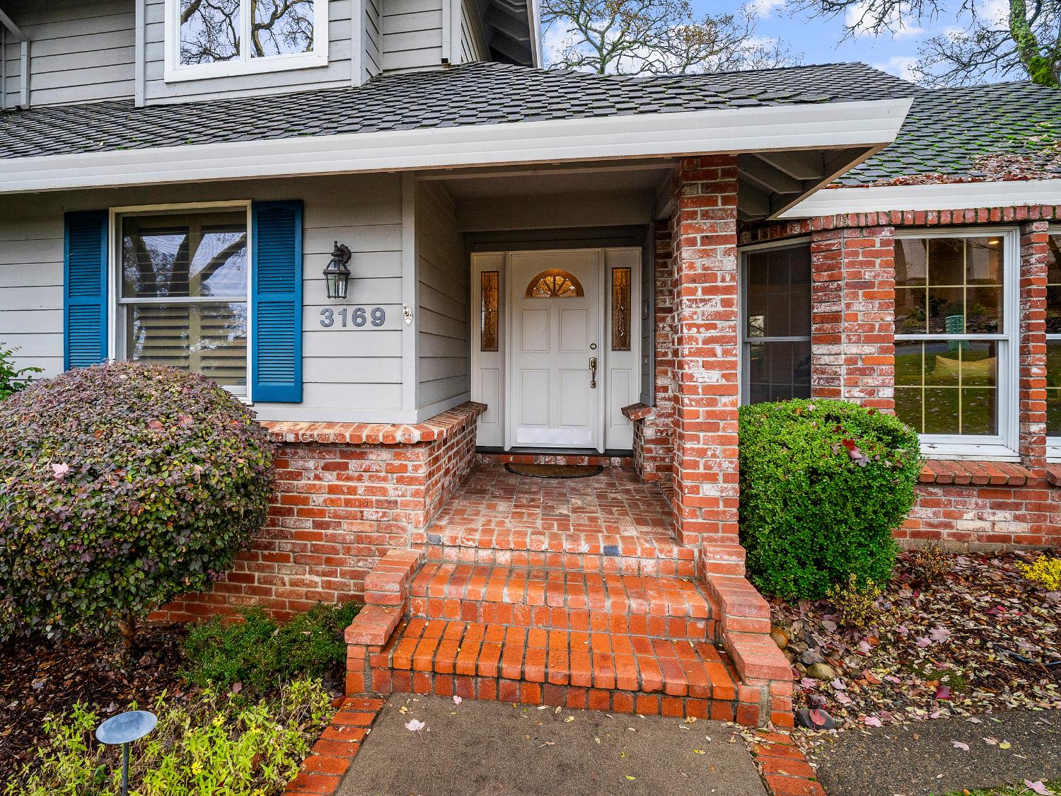 3169 Ridgeview Drive El Dorado Hills, CA 95762 - Photo 21 of 46 a front view of a house with garden