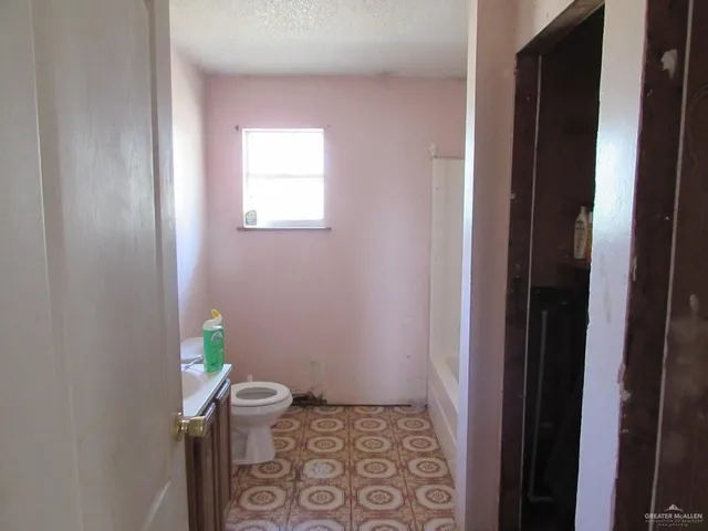 a bathroom with a toilet