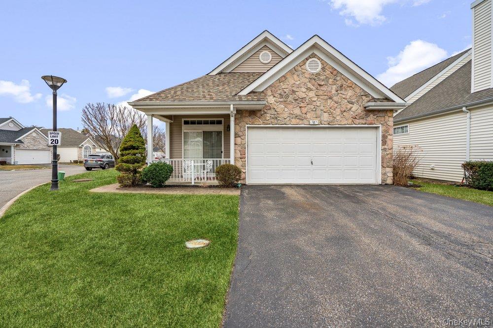 587 Leisure Drive Ridge, NY 11961 - Photo 1 of 49 a view of a house with backyard