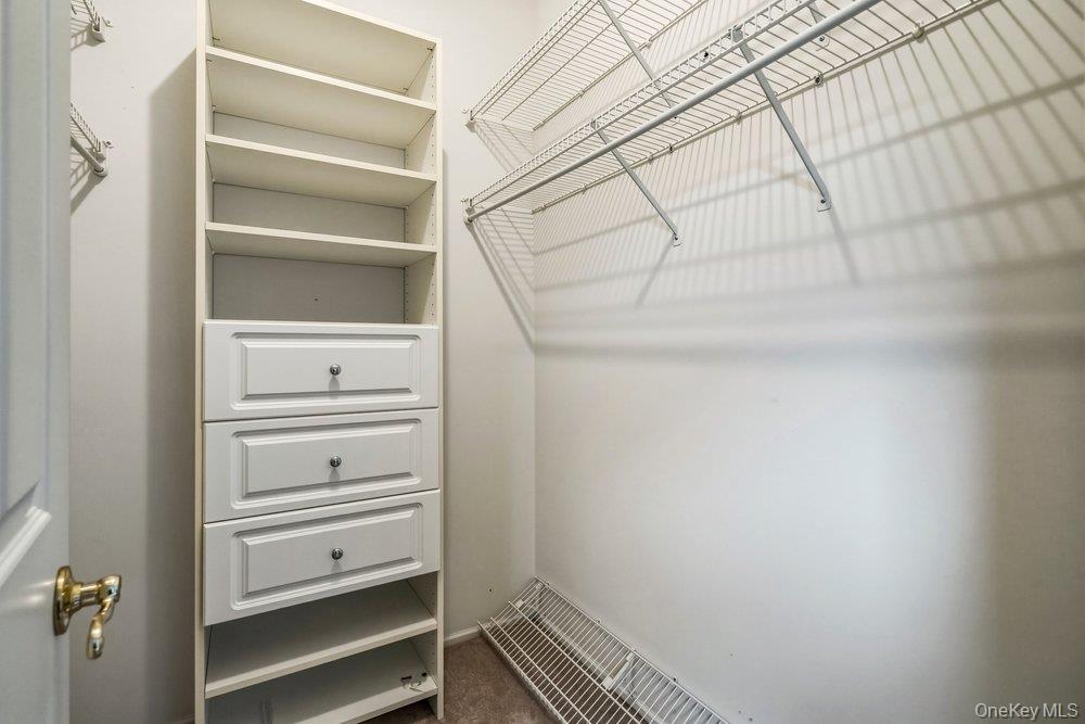 587 Leisure Drive Ridge, NY 11961 - Photo 21 of 49 a view of walk in closet