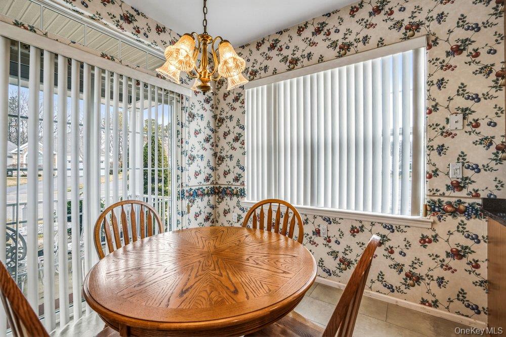 587 Leisure Drive Ridge, NY 11961 - Photo 31 of 49 a view of a balcony with furniture