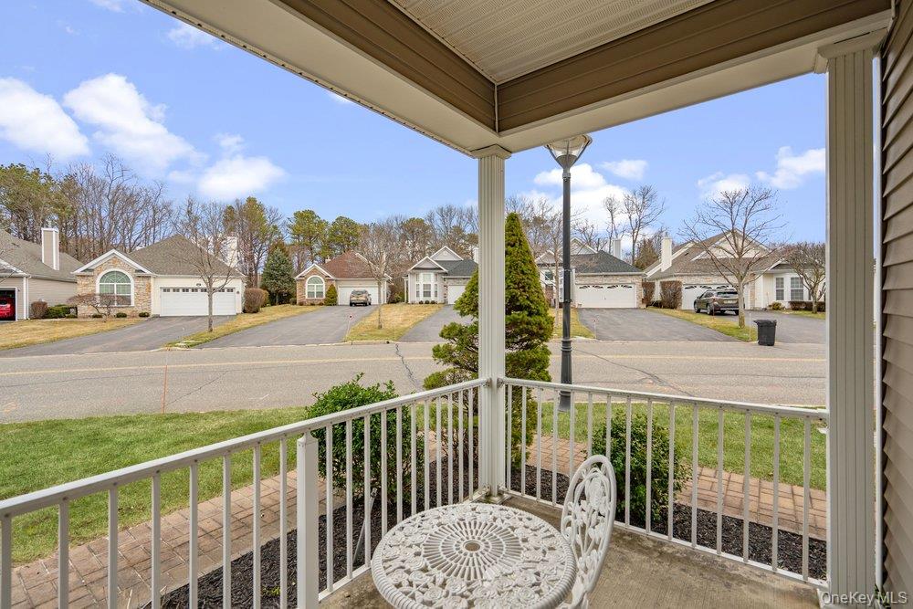 587 Leisure Drive Ridge, NY 11961 - Photo 34 of 49 a view of a building from a balcony