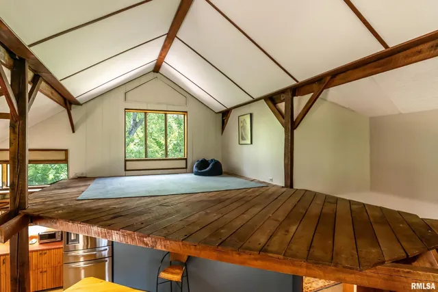 a bedroom with a bed and a walk in closet
