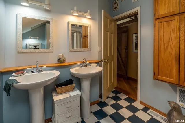 a kitchen with a stove and a microwave