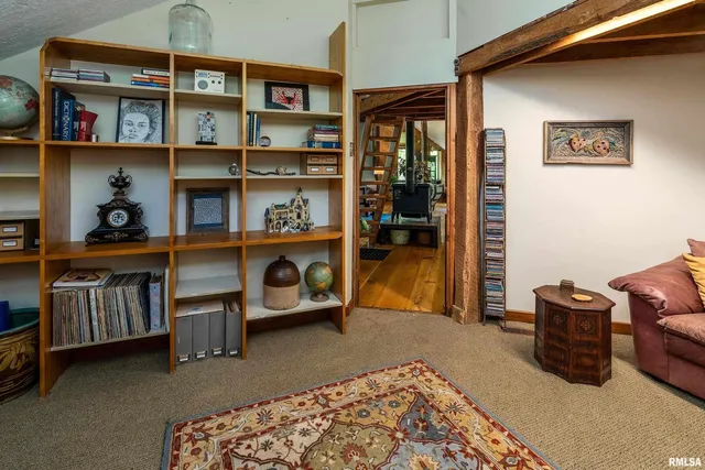 a bedroom with a bed and a cabinets