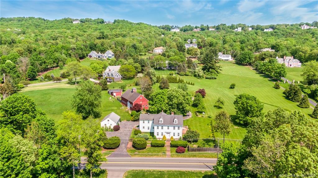 Gorgeous lush landscaping, thoughtful updates and a quintesential New England feel add to the charm and appeal of this beautifull maintained, historic 1820's Farmhouse.