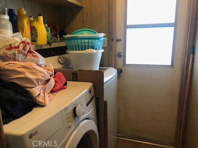 3050 West Ball Road, Unit 195 Anaheim, CA 92804 - Photo 11 of 19 a utility room with dryer and washer